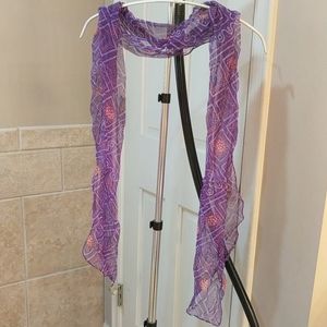 Woman's scarf is light and transparent in purple
